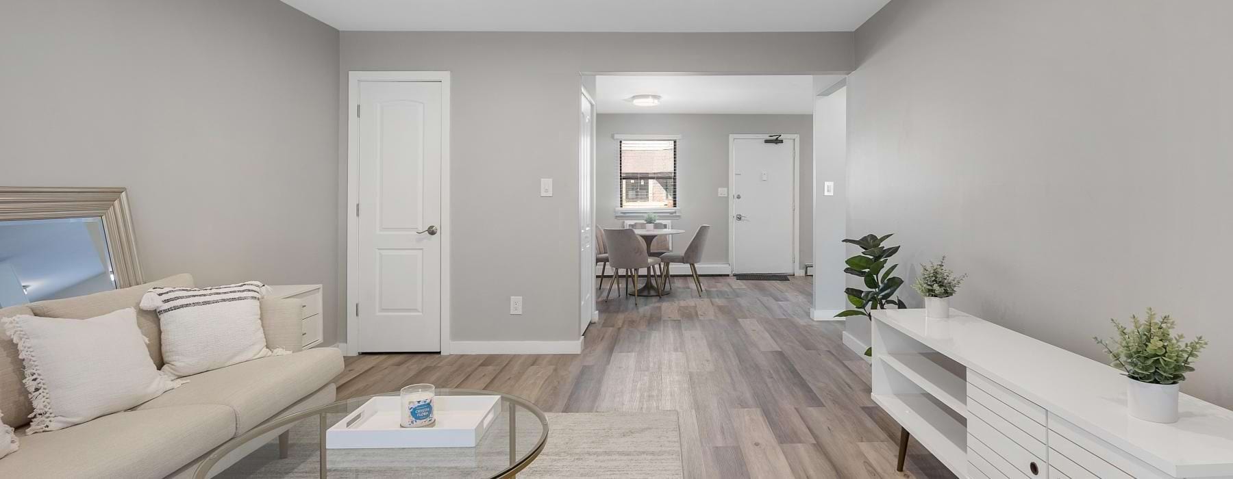 Open space living area with wood-style flooring