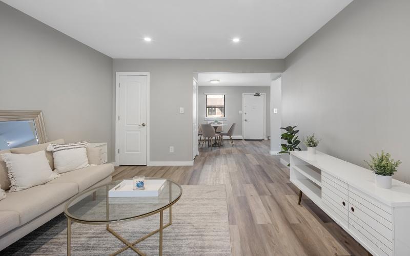 Open space living area with wood-style flooring