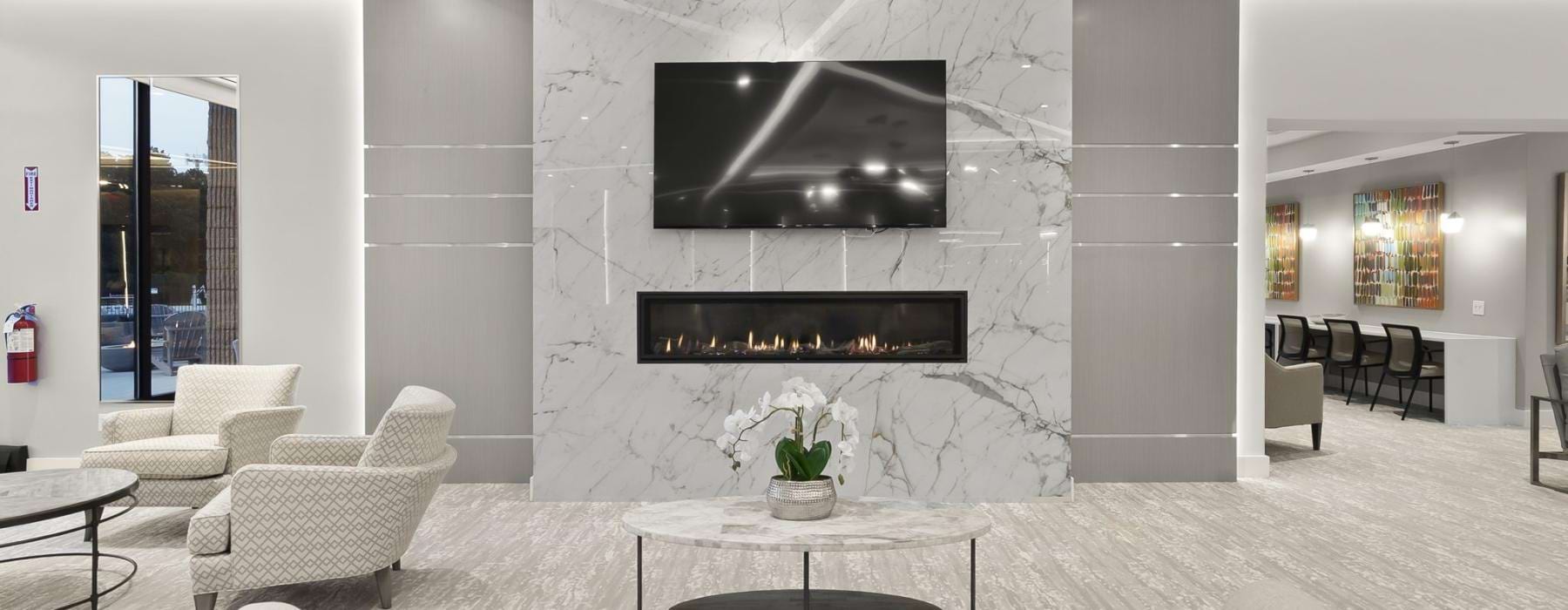 a large room with a large tv on the wall